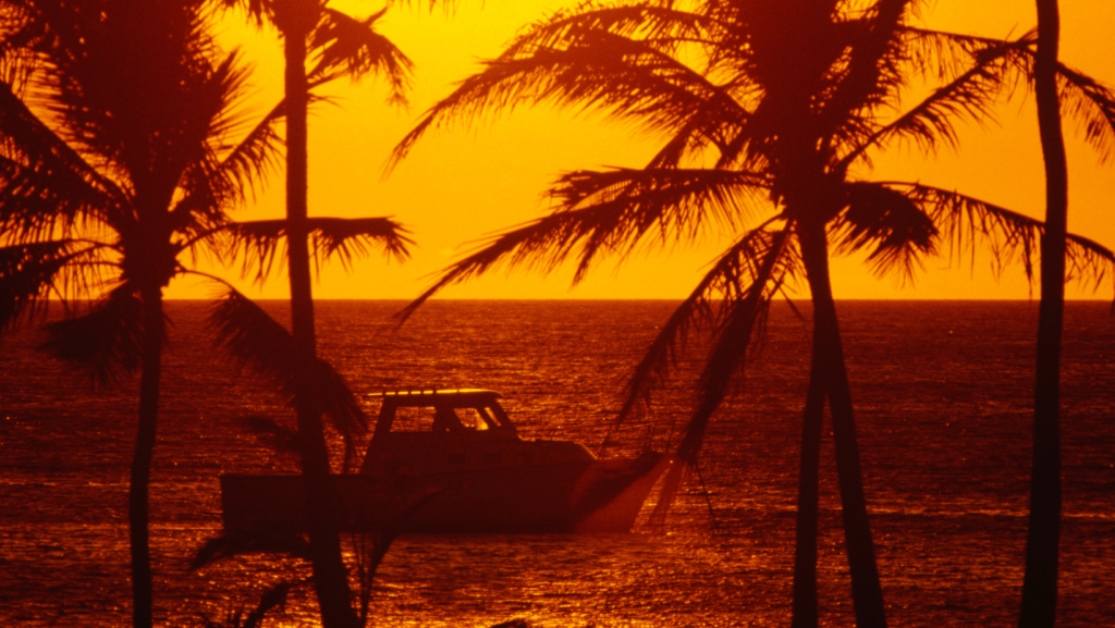 Fishing boat on the ocean off the shore of Waikoloa Hawaii on the Big Island.